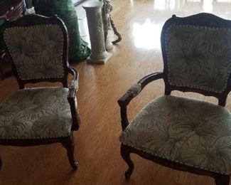 Wonderful pair of arm chairs, nice Island themed upholstery. Very comfy. 