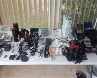 Huge selection of film and digital cameras and other electronics. 