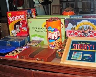 Assortment of games including backgammon, poker set, Game of Life