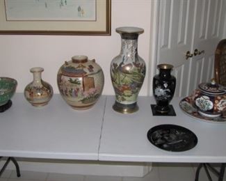 Various sizes Asian pottery. 