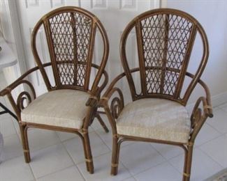 Super clean, sturdy pair of rattan high back chairs.