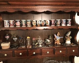12 months of Hummel mugs. 4 seasons of Avon bird eggs.  Bird figurines.