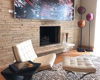 Knoll Barcelona Chair & Ottoman in Creme..Designed by Ludwig Mies van der Rohe, produced by Knoll®. Crate & Barrel sculpted ‘Pebble’ Room-sized Rug.