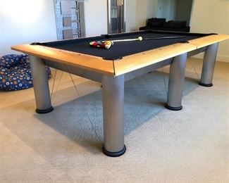 Brunswick’s contemporary and sleek Manhattan Pool Table with accessories..