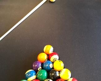 Brunswick’s contemporary and sleek Manhattan Pool Table with accessories..