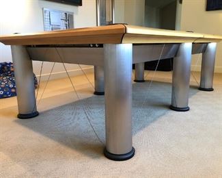 Brunswick’s contemporary and sleek Manhattan Pool Table with accessories..