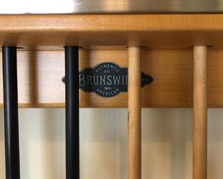 Brunswick’s contemporary and sleek Manhattan Pool Table with accessories..