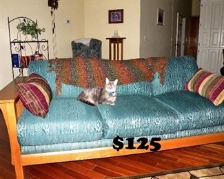 Oak Mission style green couch (cat not included)