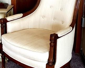 Wood trimmed upholstered arm chair