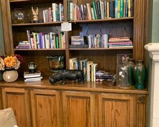 Books, CD’s, DVD’s. Hand carved wood pieces. 