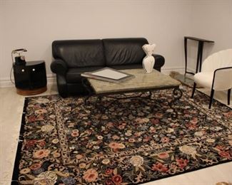 Natuzzi leather sofa; hand woven rug; Deco cabinet