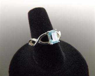 .925 Sterling Silver Emerald Cut Topaz Ring Size 7.5
