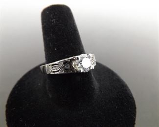 .925 Sterling Silver Crystal Solitaire with Cross Accented Shoulders Ring Size 9
