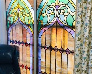 One antique stained glass window and one custom made