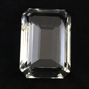 Touch of glamour from Tiffany & Co., this cut crystal paperweight design is the shape of a traditional emerald. No chips. It’s 3″w x 4″d x 2″h.  $95