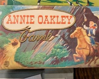 Rare 1950s Annie Oakley Board Game by Milton Bradley - Touted as a “real Wild West” game, up to four players, the object of the board game is to capture as many outlaws as one can. Like new. $30