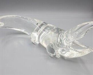 A beautiful Steuben "Alligator" glass sculpture Designed by James Houston signed. this gorgeous sculpture is a fabulous alligator sitting with his mouth open. Hard to find, this piece is truly a work of art and very rare. Measures: 9" x 5 3/4" 
Costs $600, reduced to $250