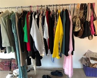 Rack of clothes and handbags