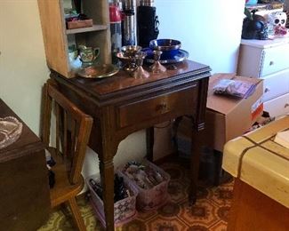 Sewing tables with machines 