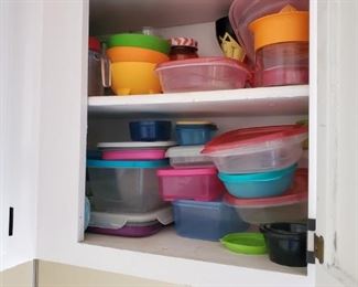 cabinets are packed, with misc and tupperware