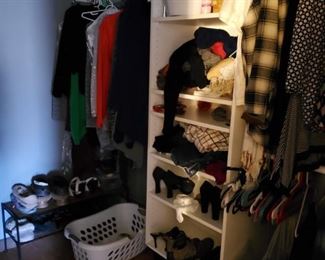 closet packed with mens and womens clothing