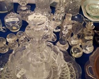 Pressed and cut glass plates, perfume bottles, etc.