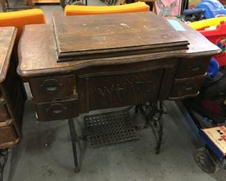 White sewing table with machine