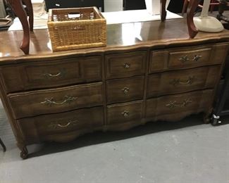 French Provincial wood tone dresser