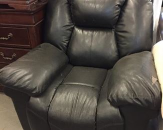 black vinyl recliner. Ripped, priced to move!