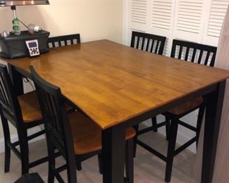 Like new tall kitchen table & 6 chairs 