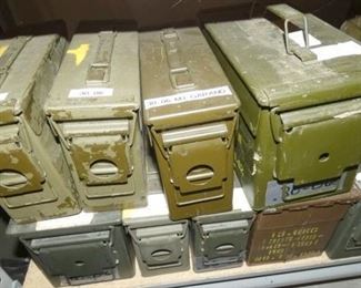 SEVERAL AMMO BOXES FULL OF AMMO 