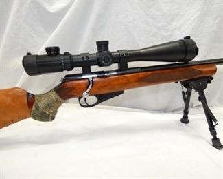 VIEW 2 CLOSEUP WINCHESTER 22 W/ SCOPE 