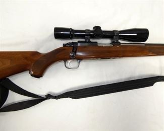 VIEW 2 CLOSEUP RUGER 77-22 W/ WEAVER SCOPE 