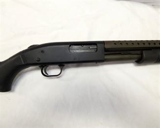 VIEW 2 CLOSEUP MOSSBERG 12GA. PUMP 