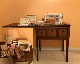 Vintage Sears Kenmore sewing machine w cabinets; bobbins, Kenmore attachments...
