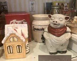Christmas house cookie jar ‘The Cellar’made exclusively for Macy’s 1986 with original box; ‘Lemonade’ pottery jar/ jug with spout, floral; vintage McCoy pottery cookie jar, ‘Smiley the Pig’ USA