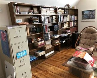 Two four draw file cabinets, adjustable book shelves, rattan chair, vintage books!