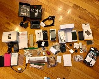 Collection of phones, iPhones, iPond, fitbits, phones covers...: Apple iPhone 4 black A1349 16GB, Apple iPhone 6 A1549 16 GB, Apple iPod Touch 8GB 2008, Verizon wireless LG/enV V cast music phone/camera with flash, Verizon EnVtouch V cast phone with touch screen, Flip Video Ultra HD Camcorder....
