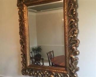 Gold toned decorative mirror