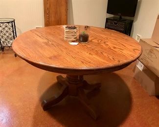 Round oak table with leaf