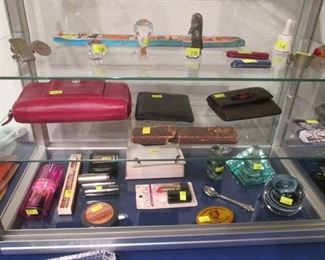 Wallets,  New Make-up, Paper Weights and More!