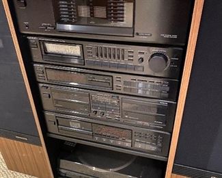 REDUCED PRICE $350 WHOLE SYSTEM.  Kenwood stereo system & cabinet; Kenwood speakers.  Pricing for individual components add up to $630.  Will sell complete system for $500.  Here are the listed components:  JL1080AV Speakers $200; LSK-01S Bookshelf speakers $15; Power Amplifier KM-208 $90; Stereo Control Amp KC206 $80; Quartz Synthesizer Stereo Tuner KT-58 $25; AV Surround Processor $35; Disc Player DP-M98 $40; Dual Cassette Deck $25; Tuner KT88 $20; Turntable KD-45F  $75; Cabinet $25