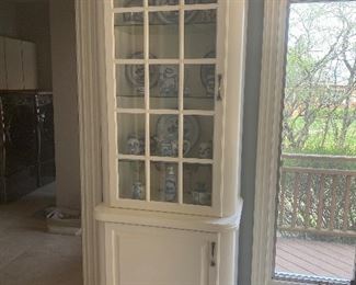 Unique wooden display cabinet with glass; 87.5" L x 31" W x 19" D.  $350