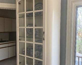 Unique wooden display cabinet with glass; 87.5" L x 31" W x 19" D.  $350