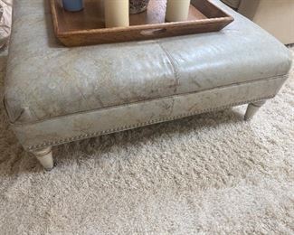 Walter E Smithe Leather ottoman with studs; wooden legs; 43" square; $275 (color is a light grey/green)