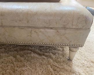 Walter E Smithe Leather ottoman with studs; wooden legs; 43" square; $275  (color is a light green)