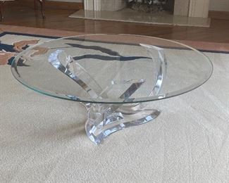Beveled Glass topped Cast acrylic sculpture coffee table; 48" diameter; $325