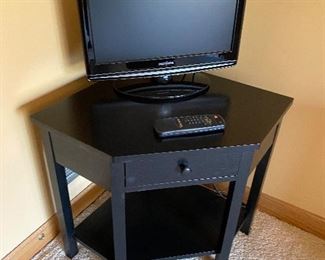  Insignia TV, $35 (corner cabinet is sold)