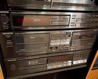 Kenwood stereo system & cabinet; Kenwood speakers.  Pricing for individual components add up to $630.  Will sell complete system for $500.  Here are the listed components:  JL1080AV Speakers $200; LSK-01S Bookshelf speakers $15; Power Amplifier KM-208 $90; Stereo Control Amp KC206 $80; Quartz Synthesizer Stereo Tuner KT-58 $25; AV Surround Processor $35; Disc Player DP-M98 $40; Dual Cassette Deck $25; Tuner KT88 $20; Turntable KD-45F  $75; Cabinet $25
