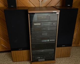 Kenwood stereo system & cabinet; Kenwood speakers.  Pricing for individual components add up to $630.  Will sell complete system for $500.  Here are the listed components:  JL1080AV Speakers $200; LSK-01S Bookshelf speakers $15; Power Amplifier KM-208 $90; Stereo Control Amp KC206 $80; Quartz Synthesizer Stereo Tuner KT-58 $25; AV Surround Processor $35; Disc Player DP-M98 $40; Dual Cassette Deck $25; Tuner KT88 $20; Turntable KD-45F  $75; Cabinet $25